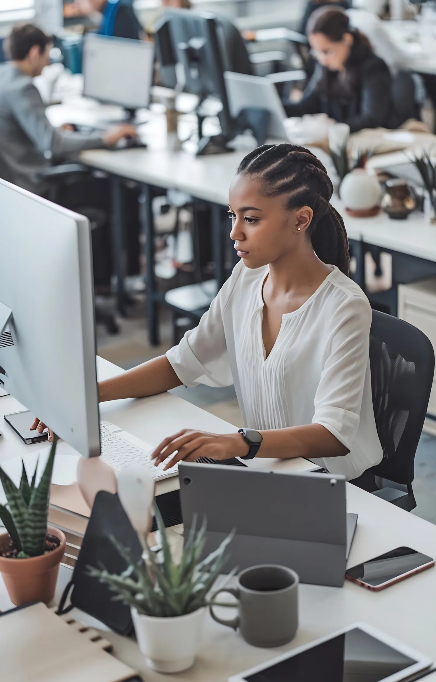 Person using a laptop at a desk